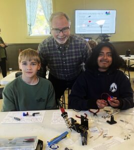 TARC teaches students how to solder LED Flashing Light kits